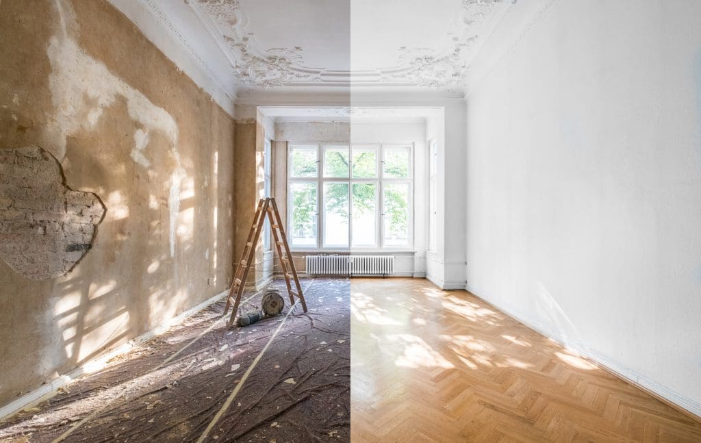 A split-view image showing the transformation of a room during renovation. The left side is in a state of disrepair with peeling walls and exposed brick, while the right side is fully renovated with freshly painted walls, polished wooden flooring, and bright sunlight streaming through large windows.