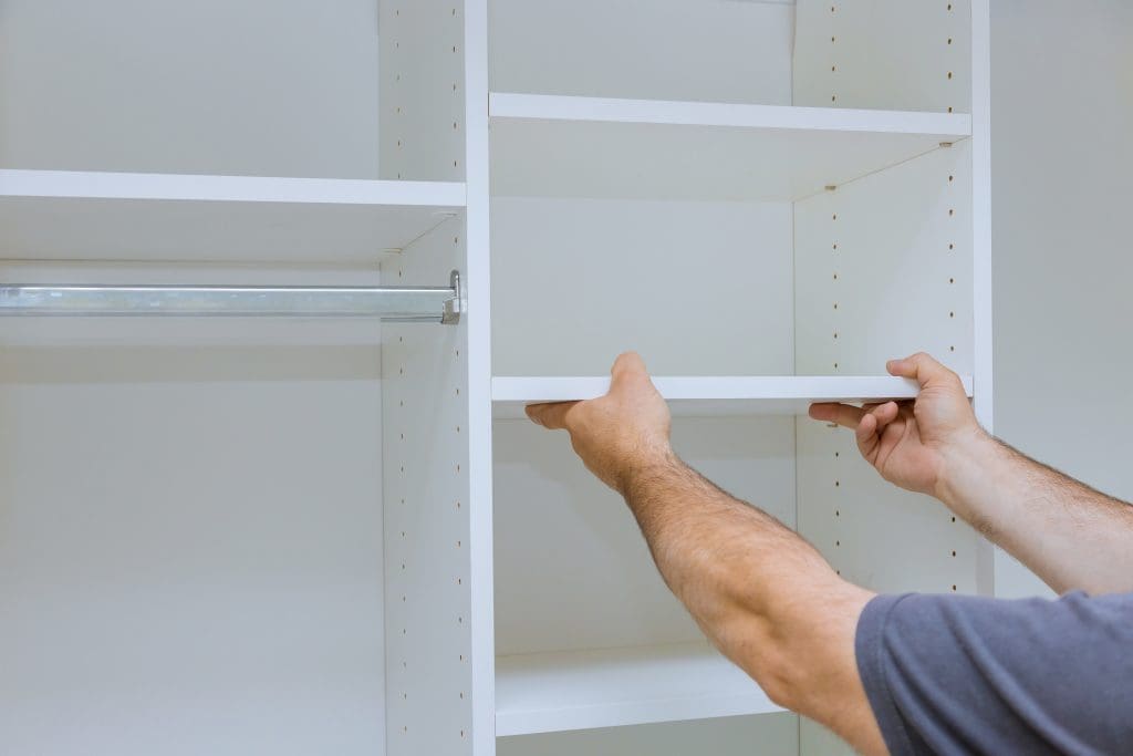 Handyman service in process of assembly and installation for furniture closet cabinet